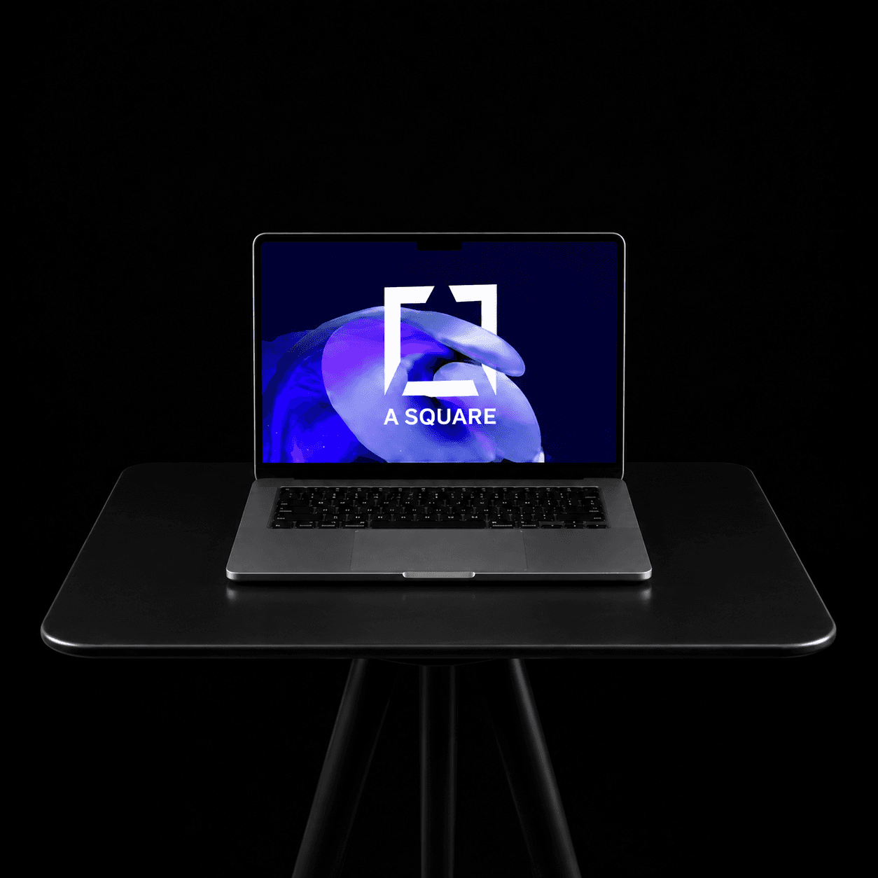 Laptop on a desk during a marketing work session